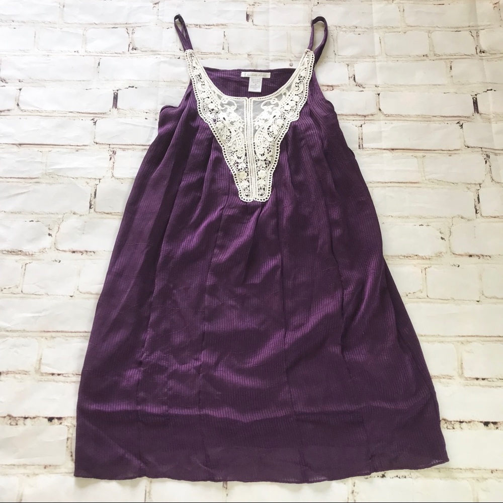 Purple dress with lace detail and adjustable hem